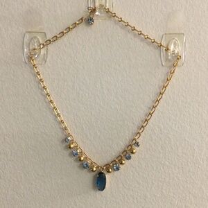 2/$15 Item 4 Necklace 15 inch gold tone chain with blue faux beads